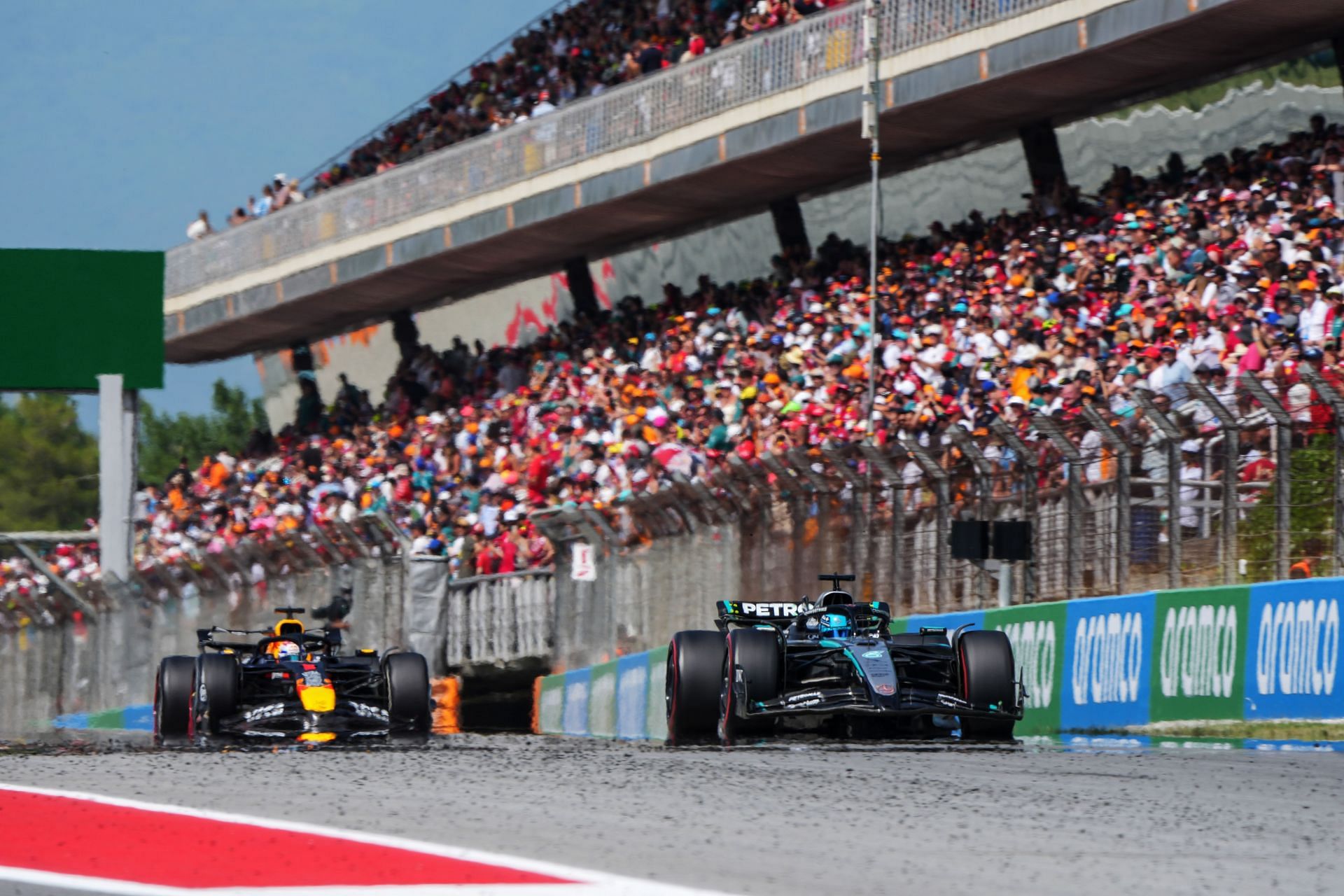 George Russell leading Max Verstappen during the Spanish GP - Source: Getty